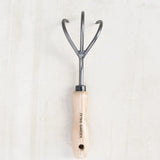 Three-pronged garden cultivator made of Swedish steel and wood - product image.